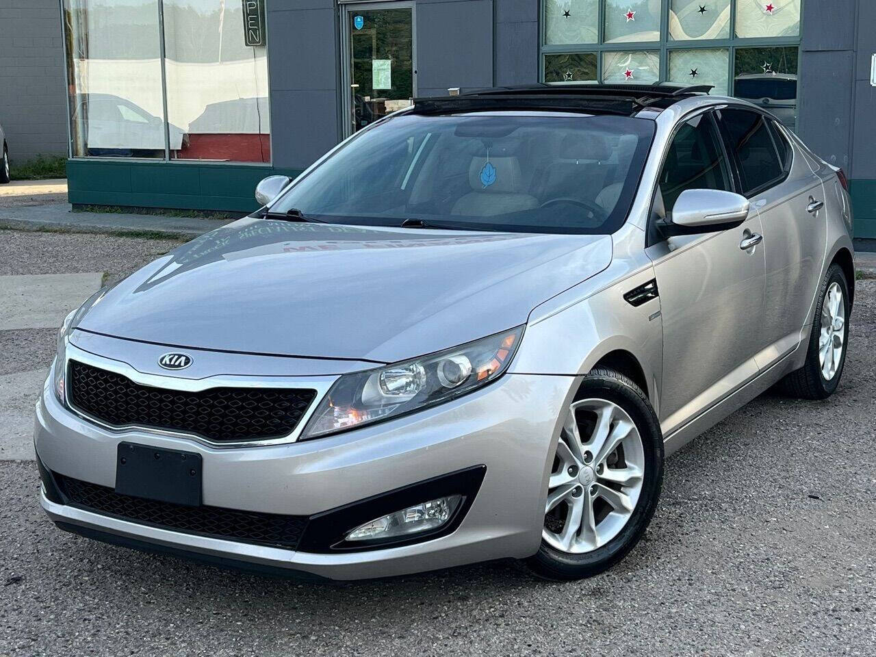 2013 Kia Optima for sale at Spartan Elite Auto Group LLC in Lansing, MI