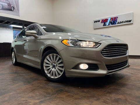 2015 Ford Fusion Hybrid for sale at Driveline LLC in Jacksonville FL