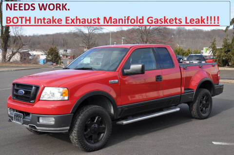2004 Ford F-150 for sale at T CAR CARE INC in Philadelphia PA