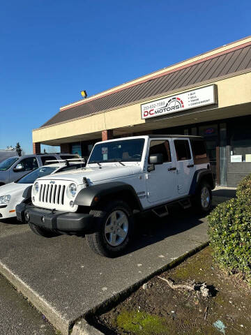 2015 Jeep Wrangler Unlimited for sale at DC MOTORS LLC in Auburn WA