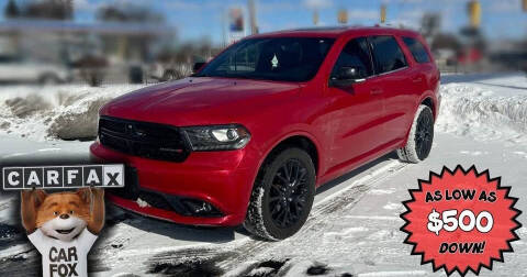 2014 Dodge Durango for sale at Dell Sells Cars in Detroit MI