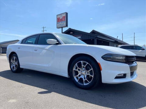 2015 Dodge Charger for sale at HUFF AUTO GROUP in Jackson MI