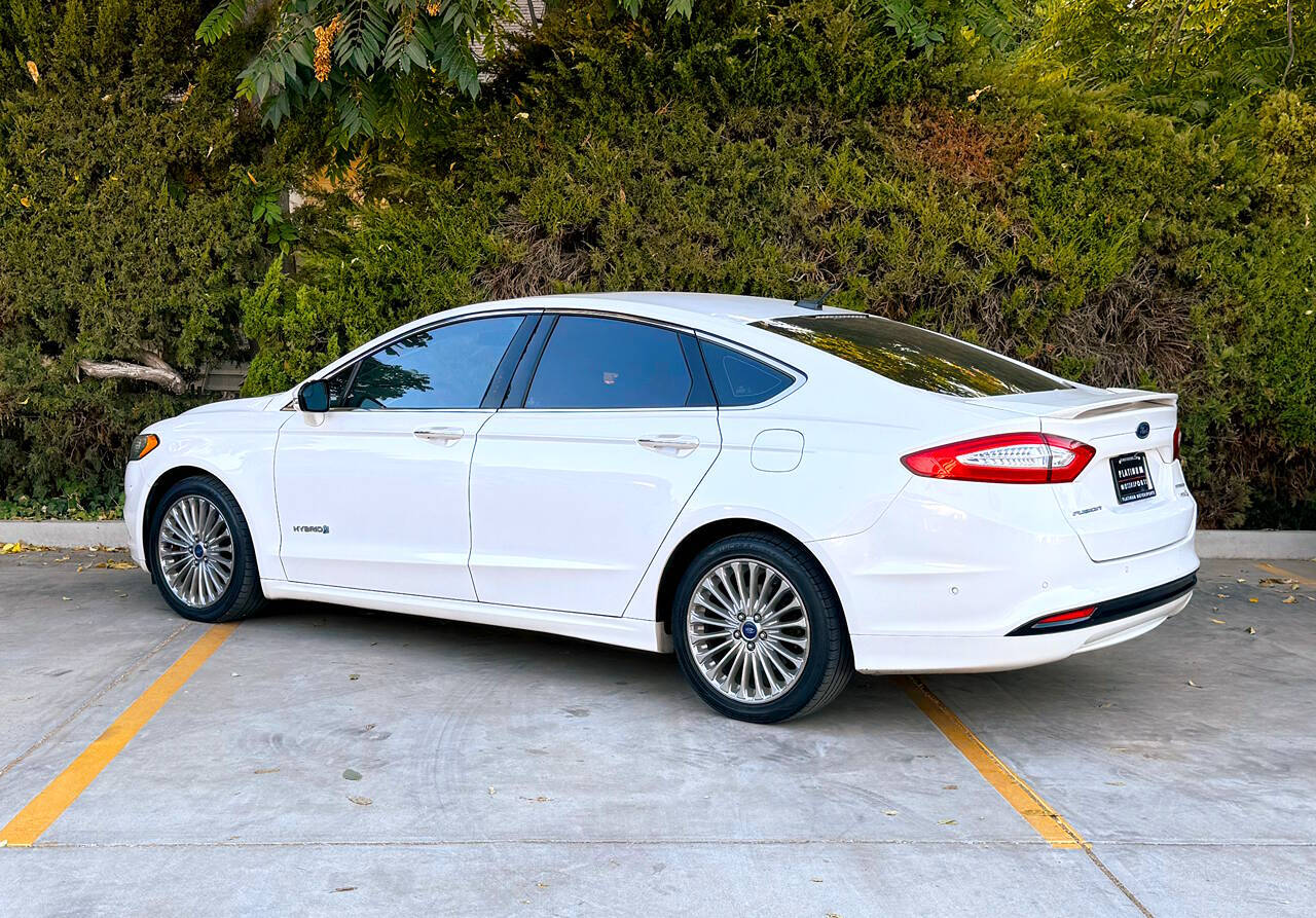 2014 Ford Fusion Hybrid for sale at Platinum motorsports in Patterson, CA