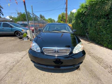 2008 Toyota Corolla for sale at Queen Auto Sales in Denver CO