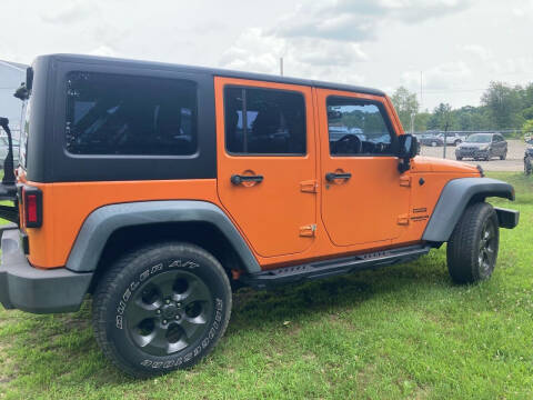 2012 Jeep Wrangler Unlimited for sale at Expressway Auto Auction in Howard City MI