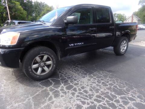 2011 Nissan Titan for sale at Pool Auto Sales Inc in Spencerport NY