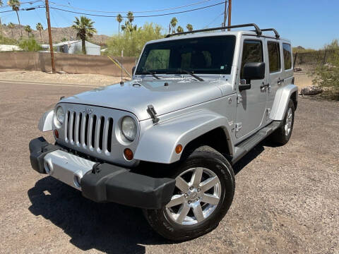 2012 Jeep Wrangler Unlimited for sale at LEGEND AUTOS in Phoenix AZ