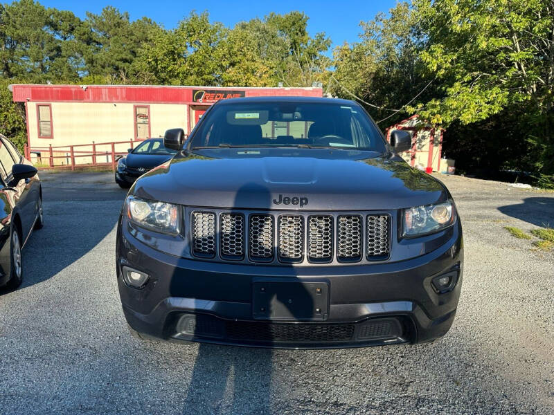 2014 Jeep Grand Cherokee for sale at REDLINE AUTO SALES in Durham NC