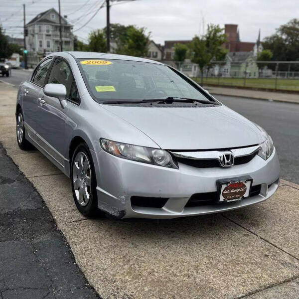 2009 Honda Civic for sale at A & J AUTO GROUP in New Bedford MA