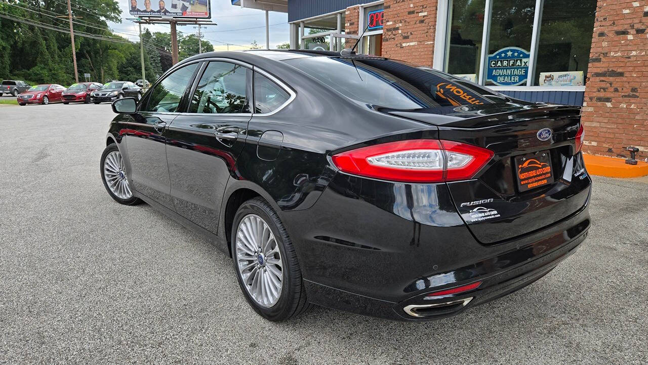 2014 Ford Fusion for sale at North Ridge Auto Center LLC in Madison, OH