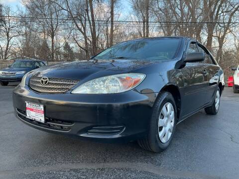2004 Toyota Camry for sale at Auto Outpost-North, Inc. in McHenry IL