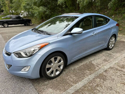 2012 Hyundai Elantra for sale at AMERICAR INC in Laurel MD