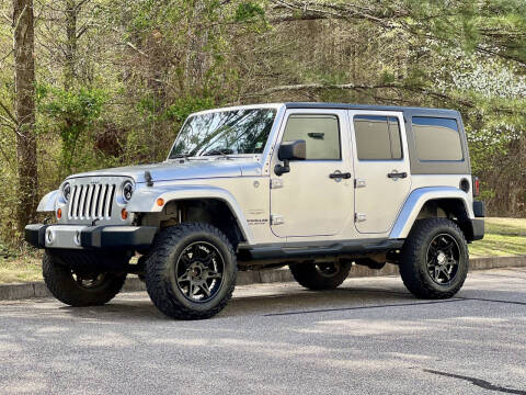 2012 Jeep Wrangler Unlimited for sale at H and S Auto Group in Canton GA