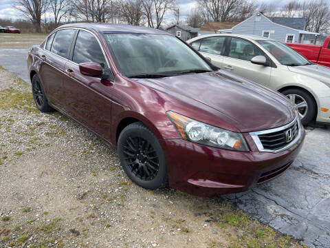 2010 Honda Accord for sale at HEDGES USED CARS in Carleton MI