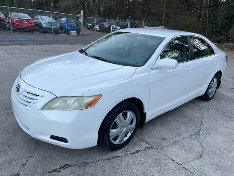 2009 Toyota Camry for sale at Legacy Motor Sales in Norcross GA