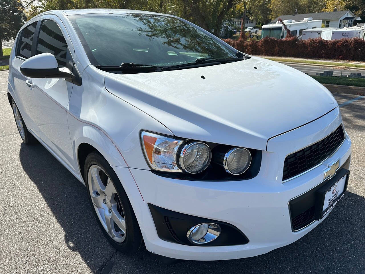 2014 Chevrolet Sonic for sale at DRIVE N BUY AUTO SALES in OGDEN, UT