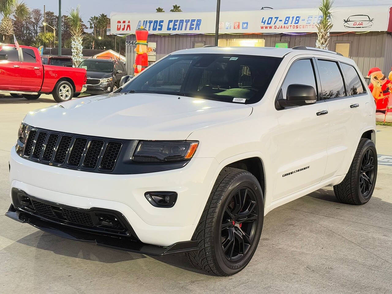 2014 Jeep Grand Cherokee for sale at DJA Autos Center in Orlando, FL