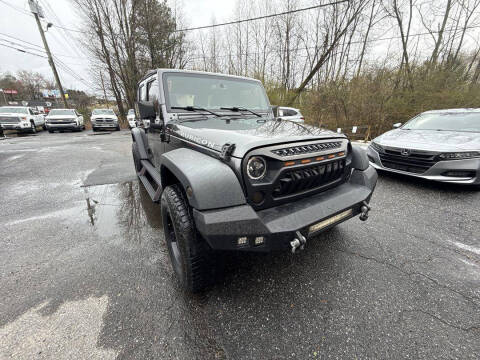 2016 Jeep Wrangler Unlimited for sale at Friendly Auto Gallery in Cumming GA