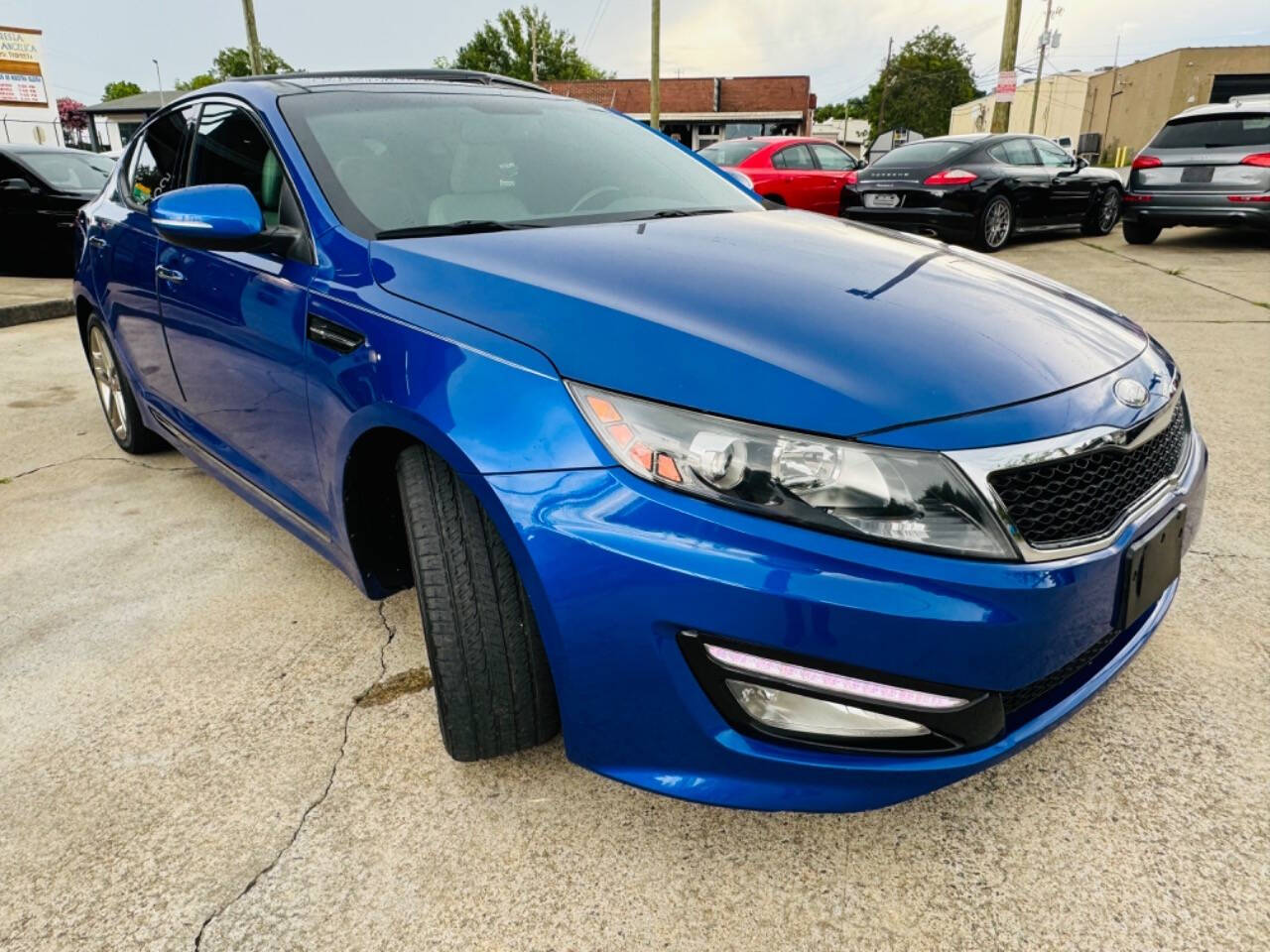 2013 Kia Optima for sale at AUTO LUX INC in Marietta, GA