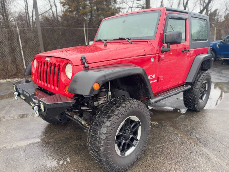 2009 Jeep Wrangler for sale at Purcell Auto Sales LLC in Camby IN