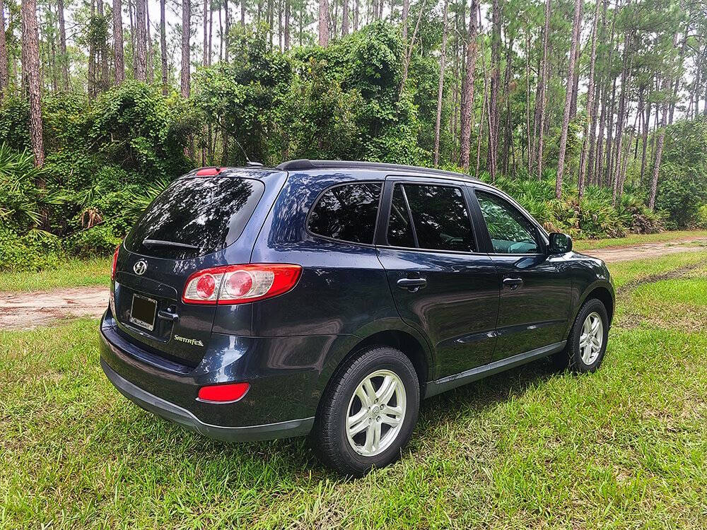 2011 Hyundai SANTA FE for sale at Flagler Auto Center in Bunnell, FL