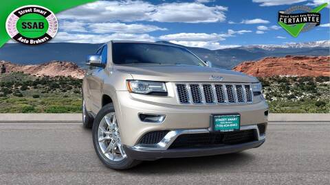 2014 Jeep Grand Cherokee for sale at Street Smart Auto Brokers in Colorado Springs CO