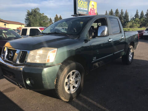 2004 Nissan Titan for sale at BELOW BOOK AUTO SALES in Idaho Falls ID