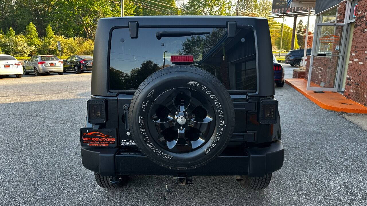 2016 Jeep Wrangler for sale at North Ridge Auto Center LLC in Madison, OH