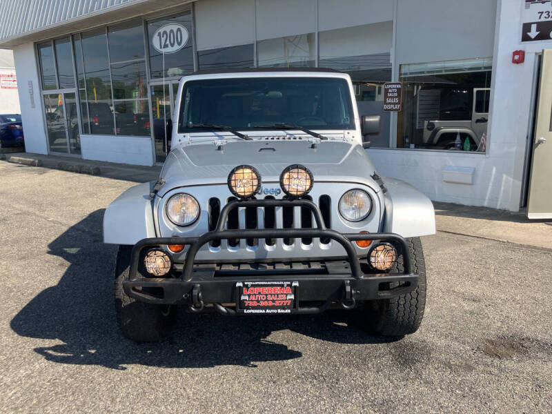 Used 2007 Jeep Wrangler Unlimited Sahara with VIN 1J8GA59157L112637 for sale in Lakewood, NJ