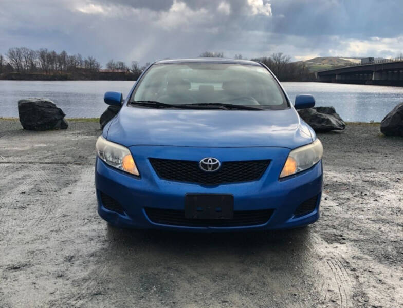 2009 Toyota Corolla for sale at T & Q Auto in Cohoes NY