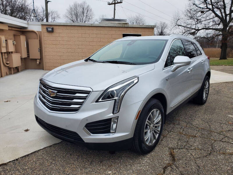 2017 Cadillac XT5 for sale at COOP'S AFFORDABLE AUTOS LLC in Otsego MI