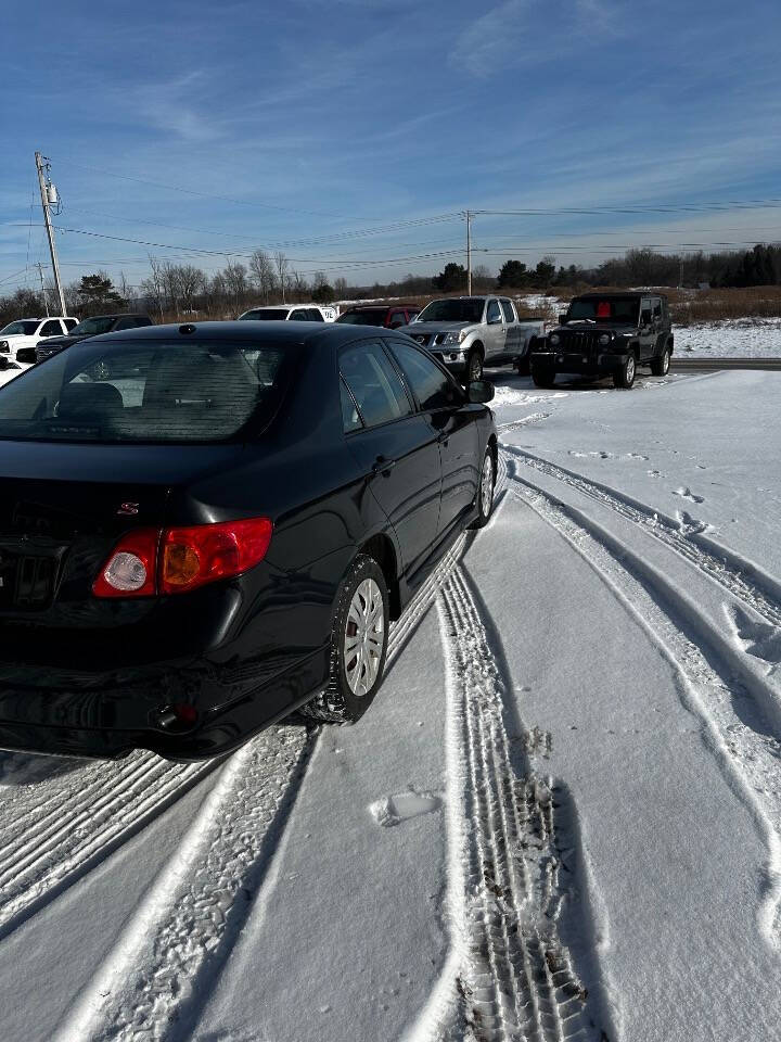 2009 Toyota Corolla for sale at Riverside Motors in Glenfield, NY