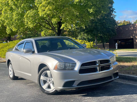 2014 Dodge Charger for sale at William D Auto Sales in Norcross GA