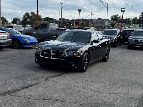 2013 Dodge Charger for sale at El Chapin Auto Sales, LLC. in Omaha NE