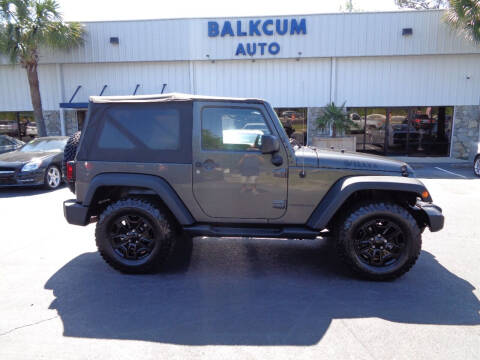 2014 Jeep Wrangler for sale at BALKCUM AUTO INC in Wilmington NC