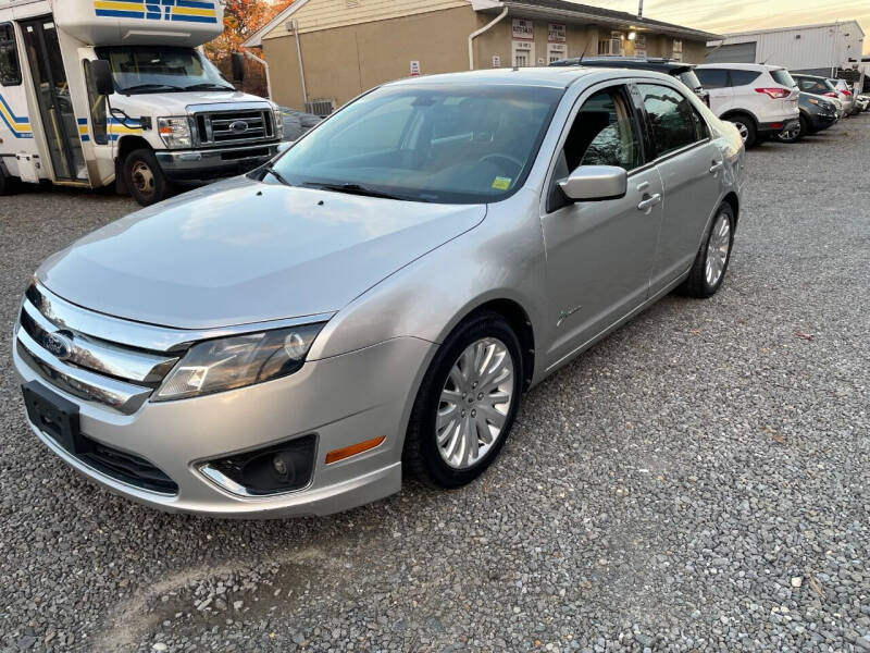 2012 Ford Fusion Hybrid for sale at Trend Auto Mall in Hasbrouck Heights NJ