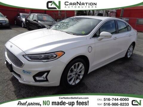 2019 Ford Fusion Energi for sale at CarNation AUTOBUYERS Inc. in Rockville Centre NY
