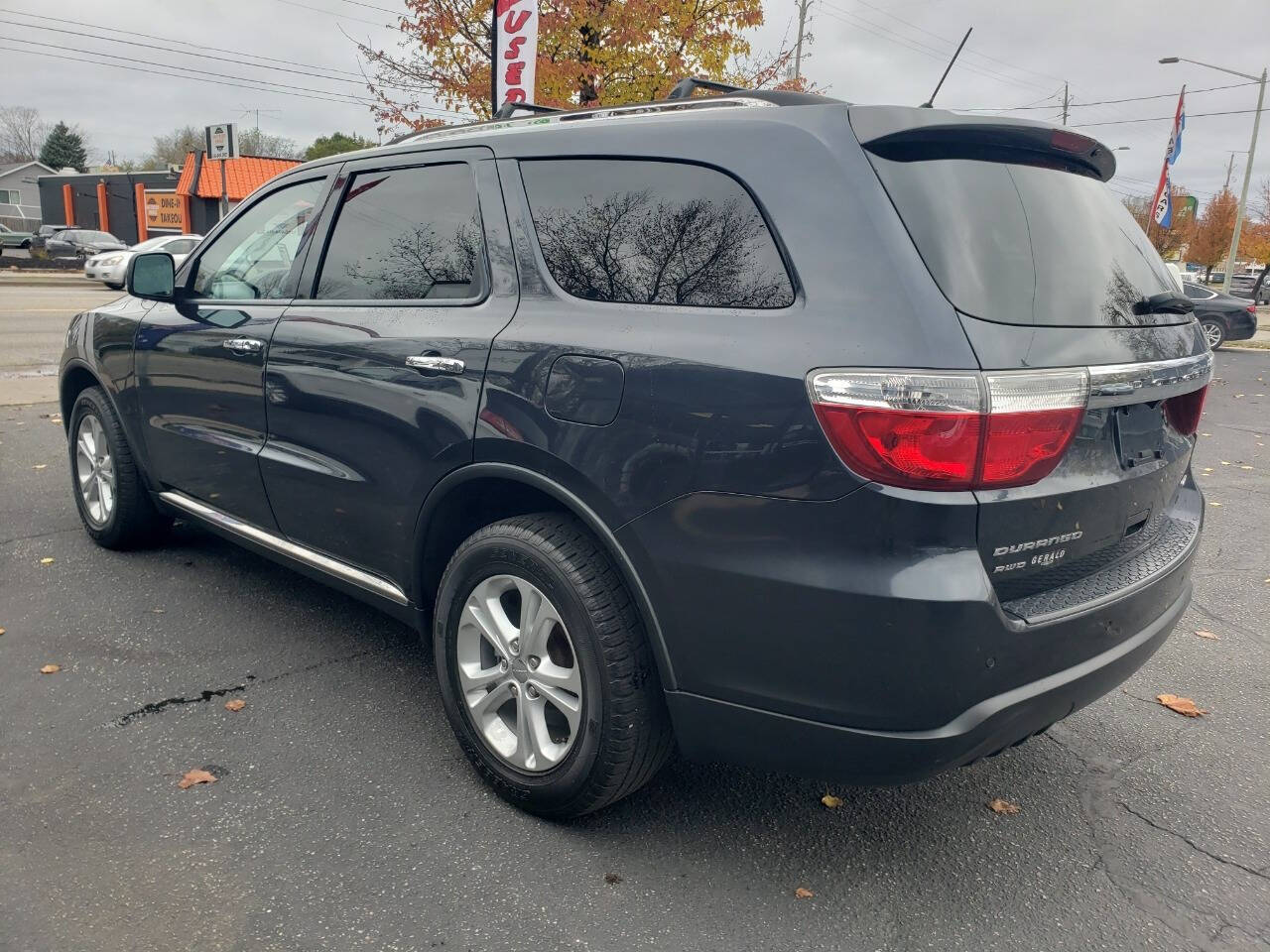 2013 Dodge Durango for sale at Auto Shop in Wyoming, MI