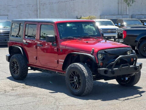 2012 Jeep Wrangler Unlimited for sale at Curry's Cars - Brown & Brown Wholesale in Mesa AZ