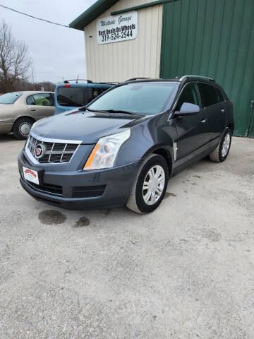 2012 Cadillac SRX for sale at WESTSIDE GARAGE LLC in Keokuk IA