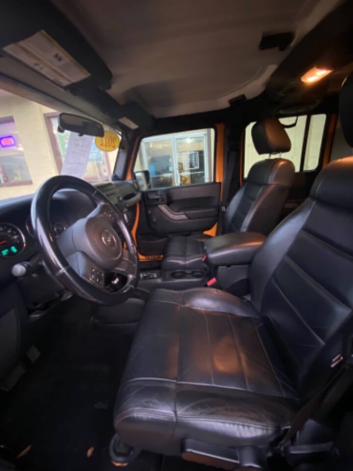 2012 Jeep Wrangler Unlimited for sale at Post Rd Motors in Indianapolis, IN