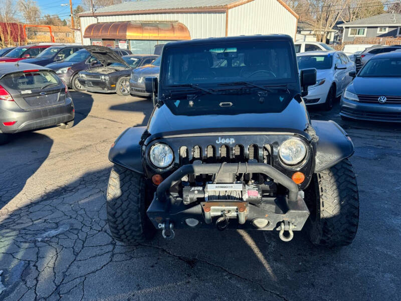 2013 Jeep Wrangler Unlimited for sale at SANAA AUTO SALES LLC in Englewood CO