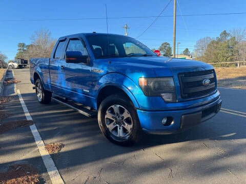 2014 Ford F-150 for sale at THE AUTO FINDERS in Durham NC