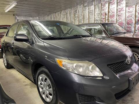 2009 Toyota Corolla for sale at The Car Store in Milford MA