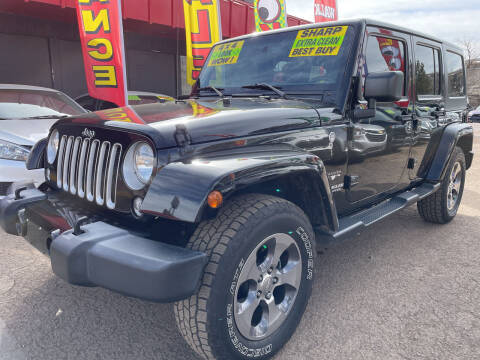 2016 Jeep Wrangler Unlimited for sale at Duke City Auto LLC in Gallup NM