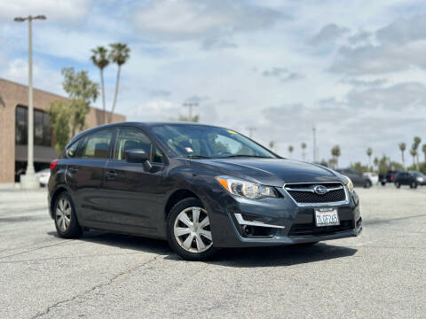 2015 Subaru Impreza for sale at BARMAN AUTO INC in Bakersfield CA