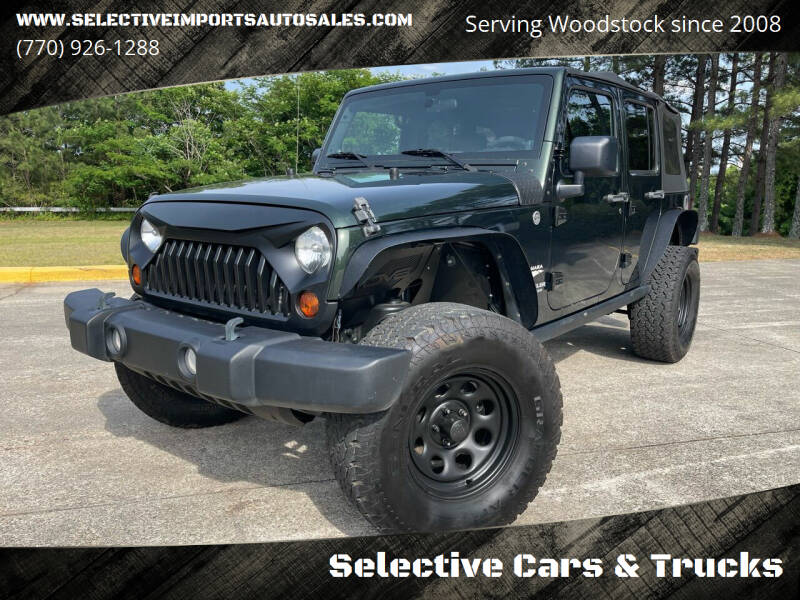 2010 Jeep Wrangler Unlimited for sale at Selective Cars & Trucks in Woodstock GA