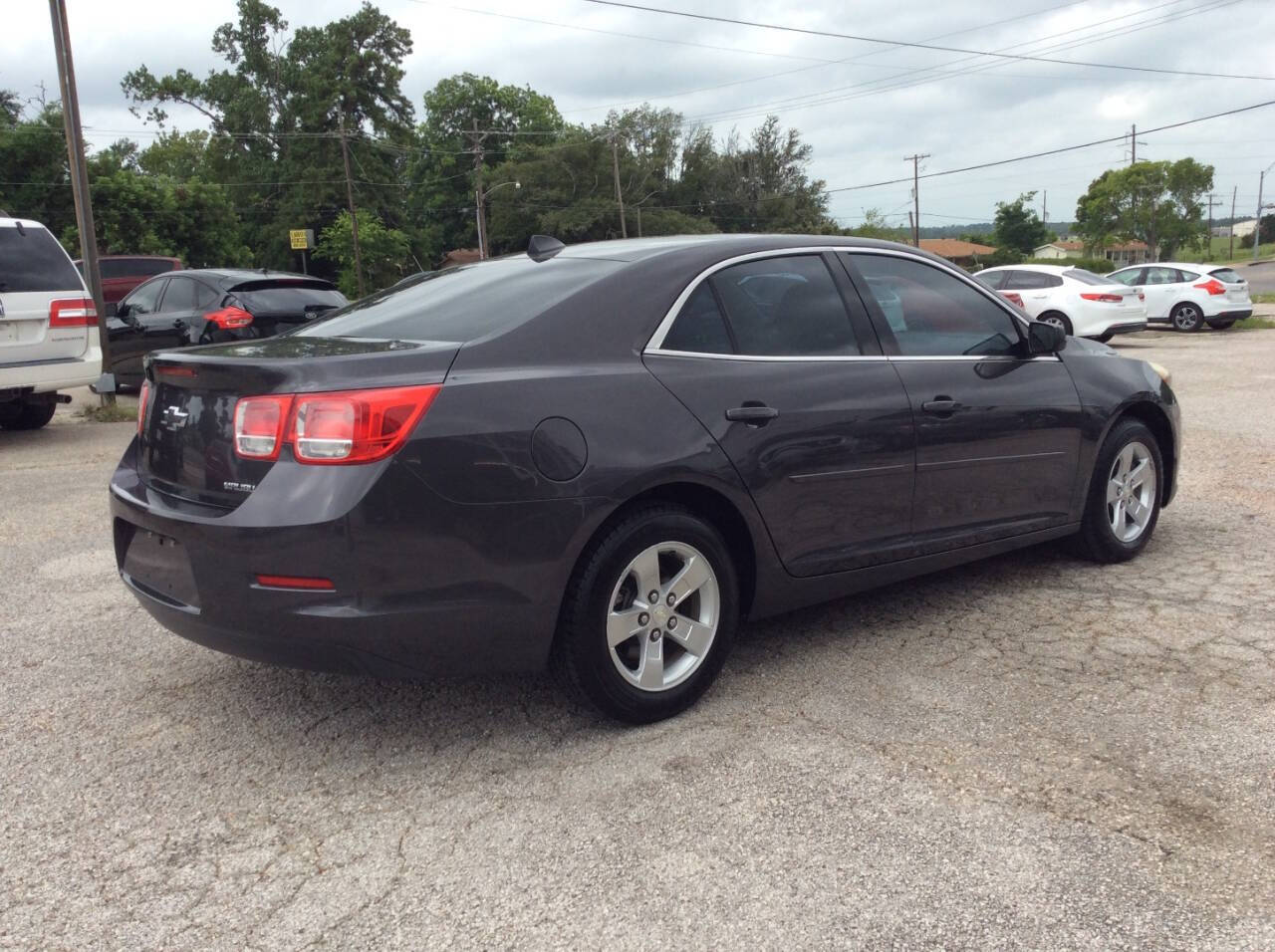 2013 Chevrolet Malibu for sale at SPRINGTIME MOTORS in Huntsville, TX