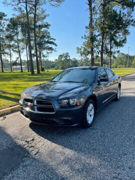 2013 Dodge Charger for sale at KMC Auto Sales in Jacksonville FL