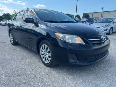 2013 Toyota Corolla for sale at Marvin Motors in Kissimmee FL